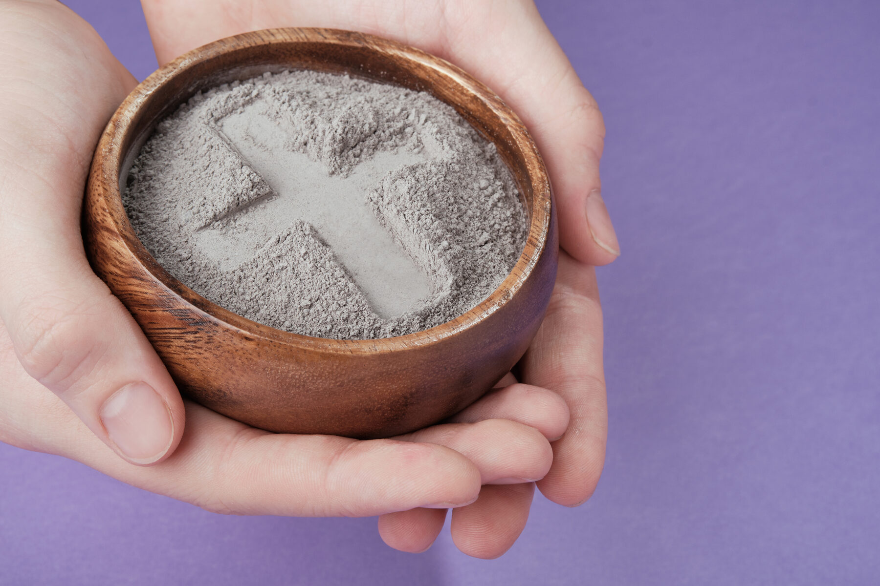 A bowl of ashes marked with a cross